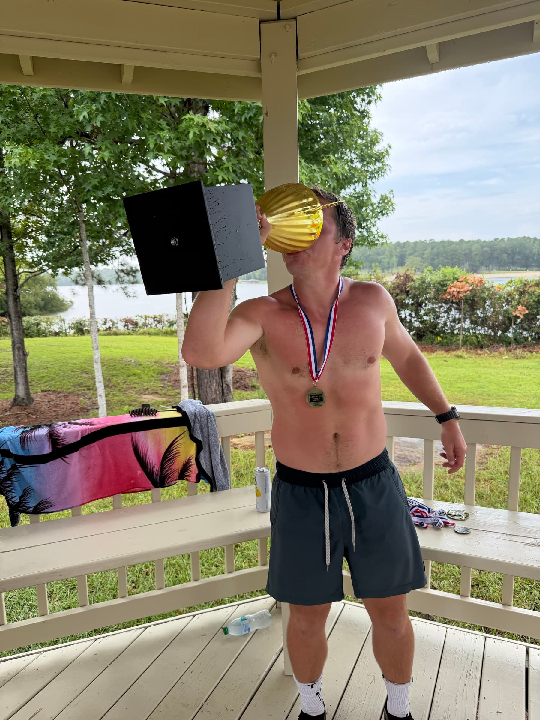Kyle Steinmeyer chugging from the Most Wicked Day trophy after winning the 2026 championship
